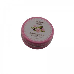 Mały okrągły, dwuczęściowy balsam do ust, kosmetyczne opakowanie