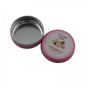 Mały okrągły, dwuczęściowy balsam do ust, kosmetyczne opakowanie