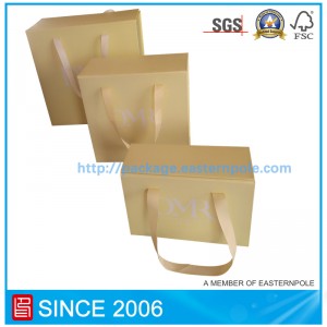 Żółte, składane pudełko na magnes