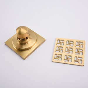 Płytka odpływowa z prysznicem w betonowej podłodze