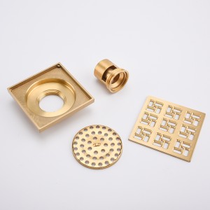 Płytka odpływowa z prysznicem w betonowej podłodze