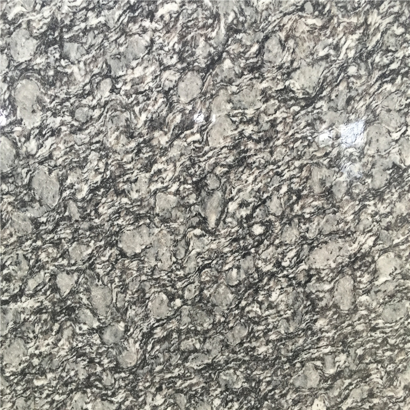 Spryskaj białą granitową płytę morską