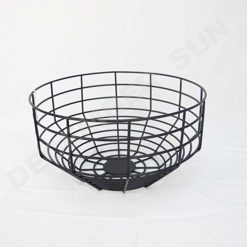 Okrągły metalowy kosz z owocami