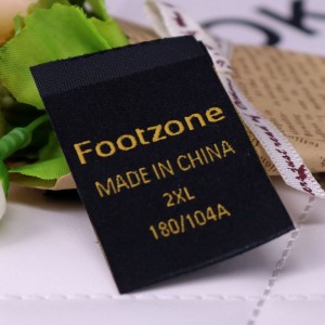 Wspieraj indywidualne ubrania tkane etykiety