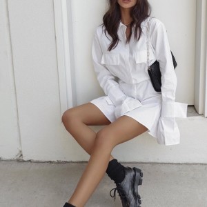 Francuska biała sukienka z talią i mankietami oraz długimi zakładkami dla kobiet 2023 Nowy projekt talii i stały kolorowy spódnica z długimi rękawami