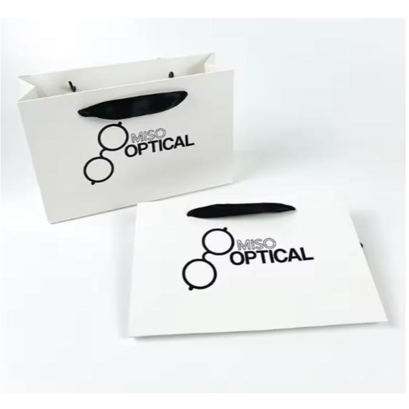 Drukowane papierowe torby kartonowe luksusowe białe papierowe torbana papier z kraft z wstążką do torbyna zakupy z własnym logo